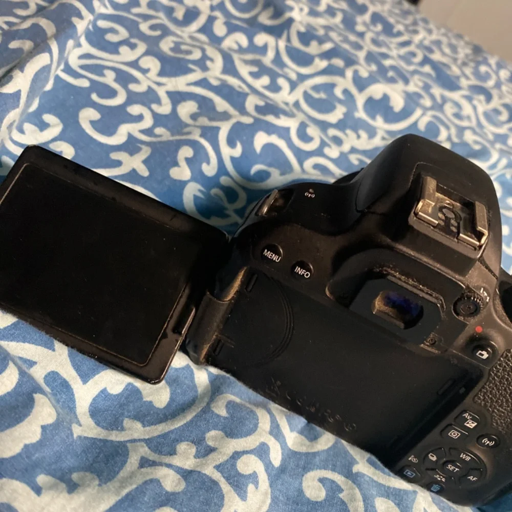 Canon T7i, Canon 50mm lens, Godax V1c flash